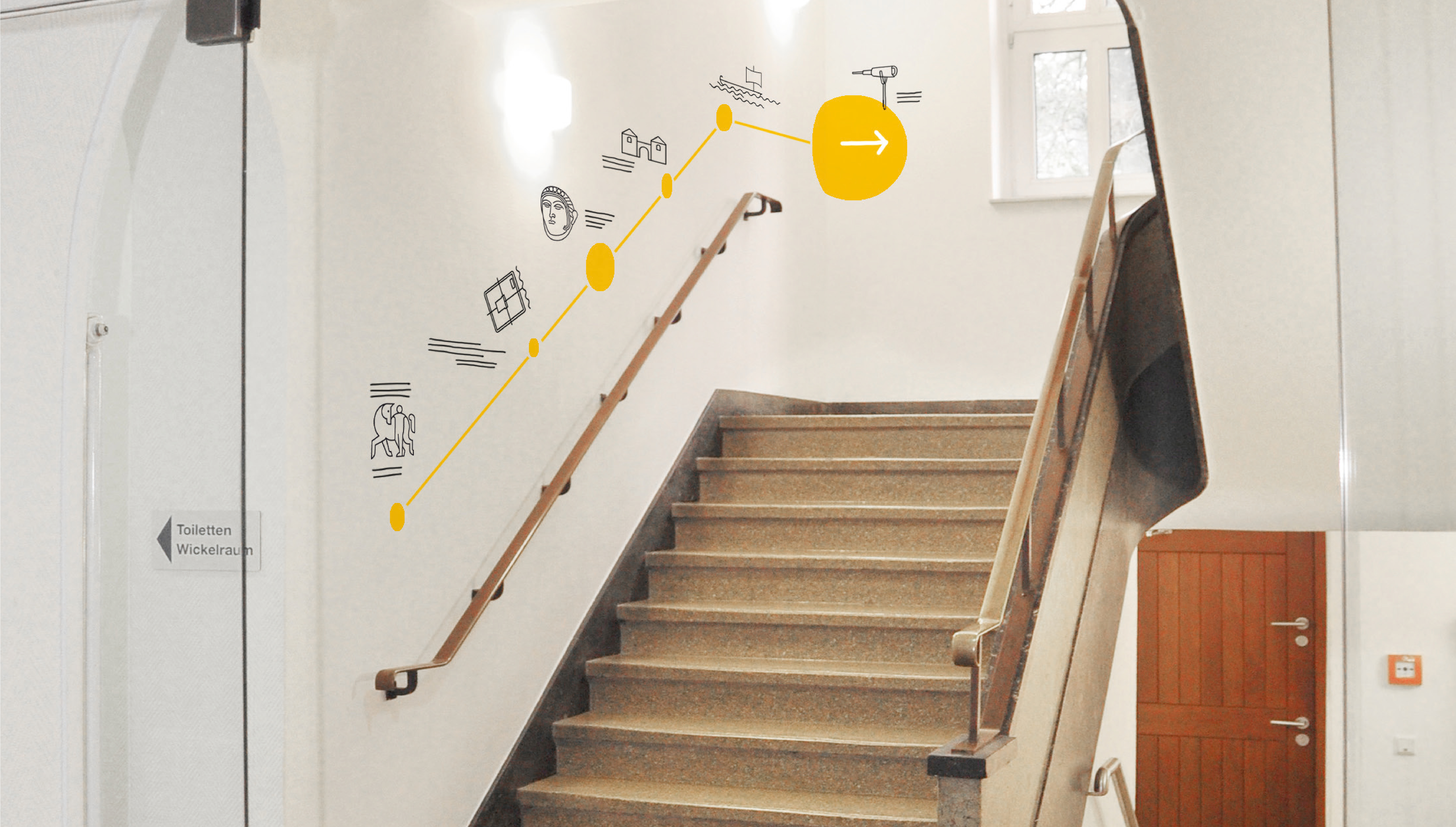 Treppenaufgang mit Wandgrafiken