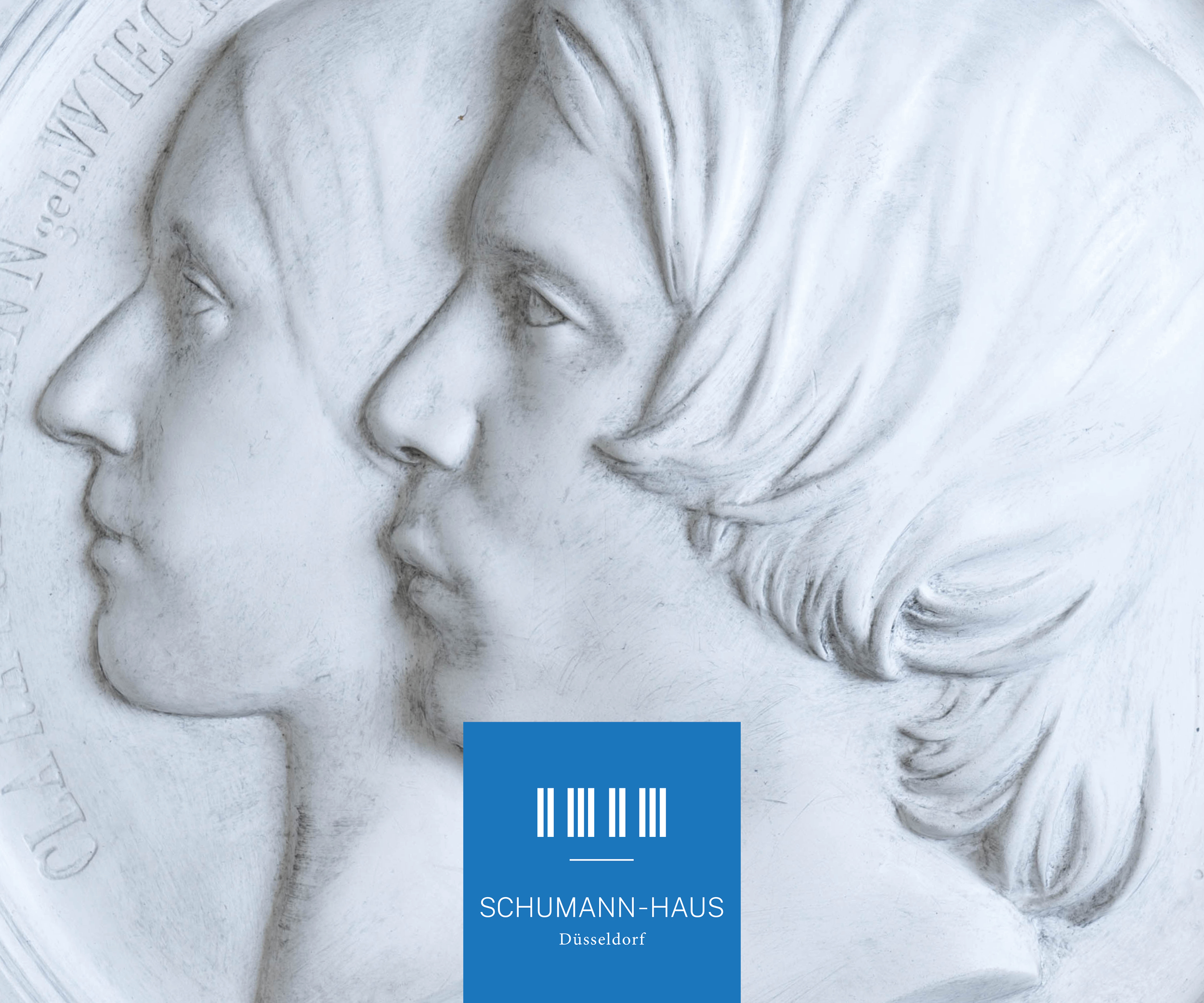 Silhouette von Clara und Robert Schumann mit „Schumann-Haus Düsseldorf“ Logo