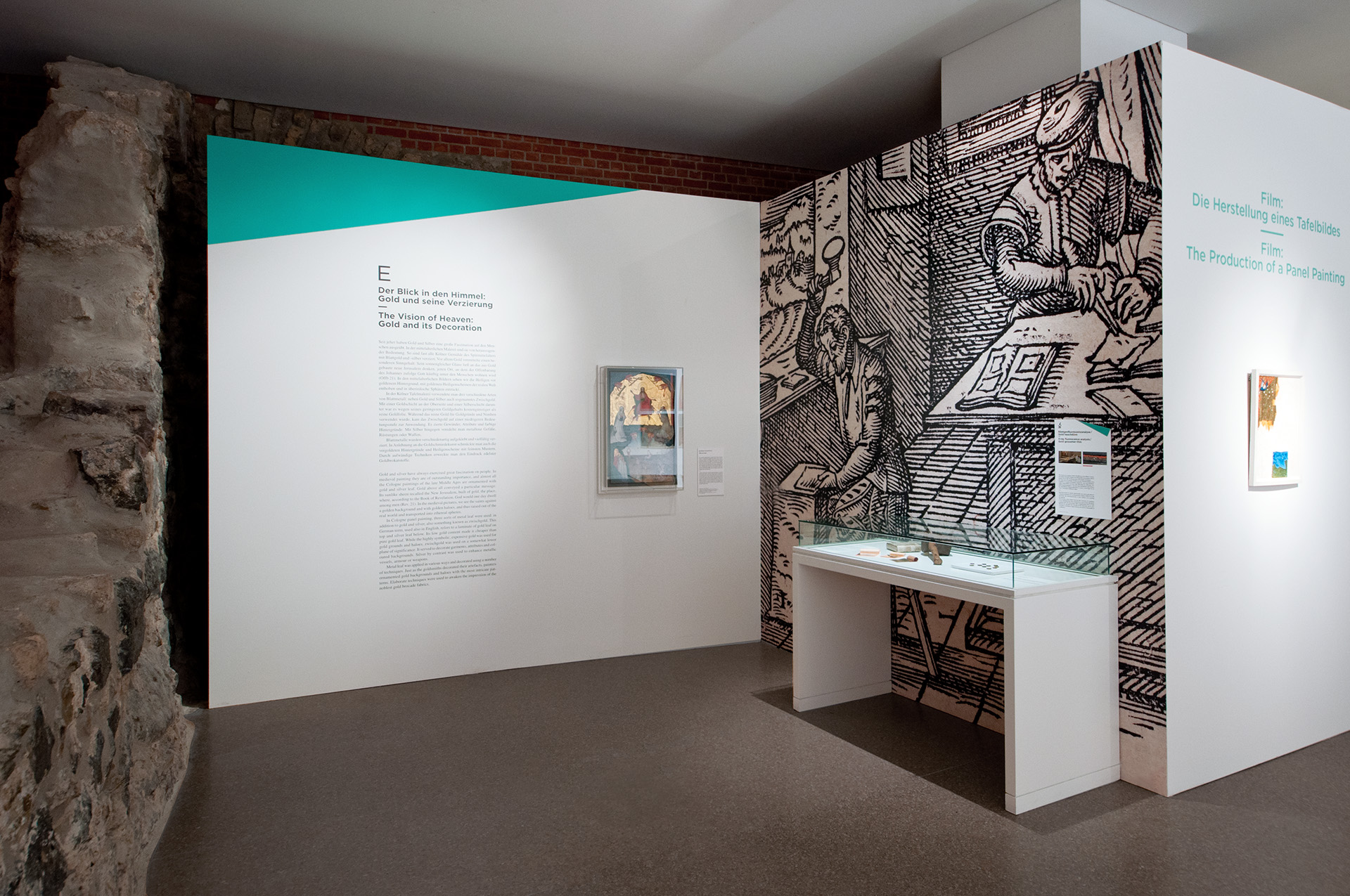 Ausstellungswand mit großer Illustration auf der 2 Männer arbeiten