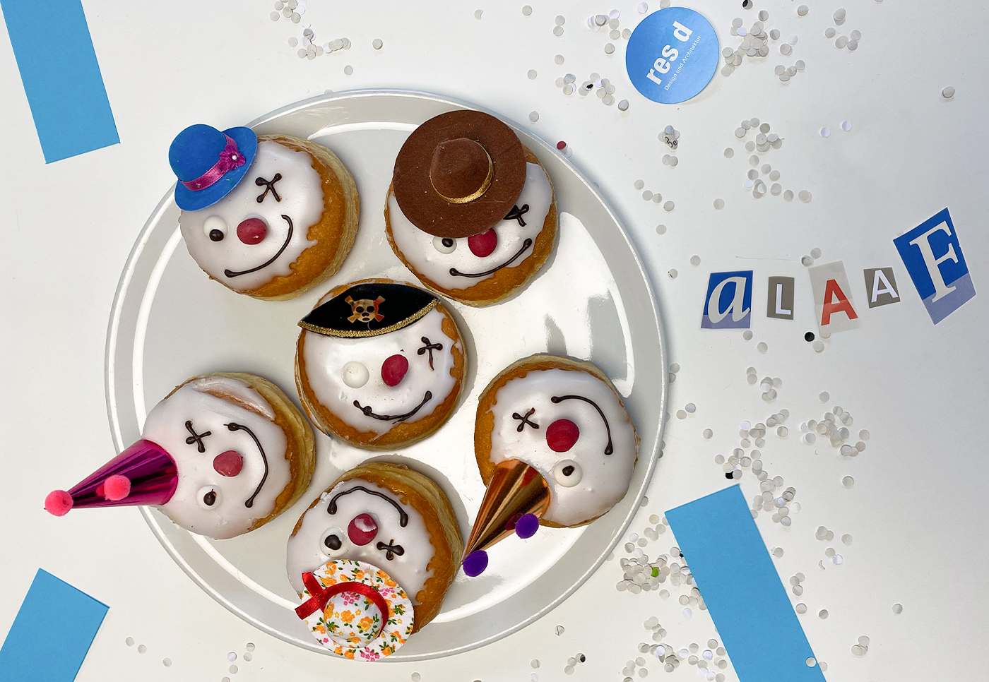 Muffins mit Clownsgesichtern